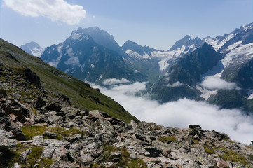 Northern great caucasus mountains near dombay with glaciers and snow in august 2019, original raw picture