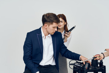 man and woman fighting over white background