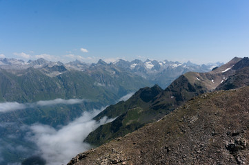 Northern great caucasus mountains near dombay with glaciers and snow in august 2019, original raw...
