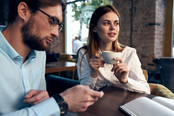 young couple in cafe