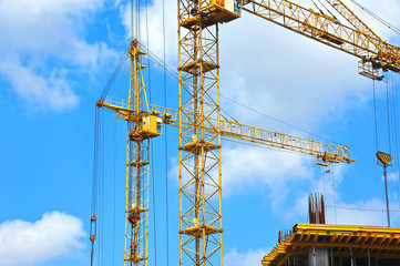 Crane and highrise construction site