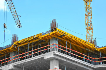 Fototapeta premium Crane and highrise construction site