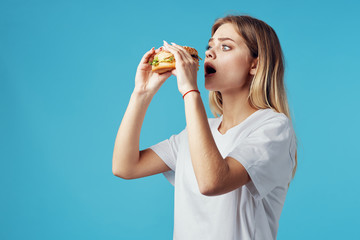 young woman drinking water from a bottle