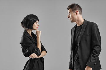 man and woman fighting over white background