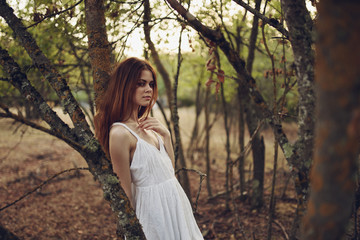 young woman in the forest
