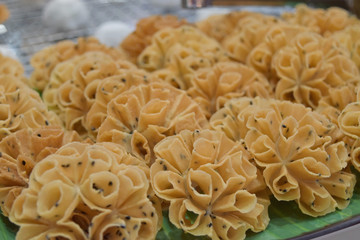 Crispy Lotus Blossom Cookie on banana leaf.  Thailand desserts.