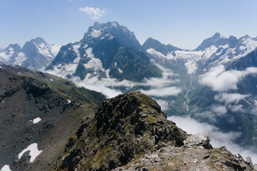 Northern great caucasus mountains near dombay with glaciers and snow in august 2019, original raw picture