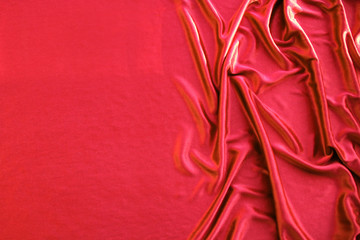 Photograph of silk fabric, beige color. The texture of silk fabric. Luxury silk fabric background...