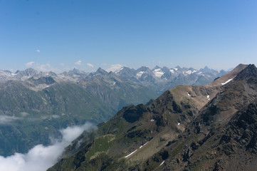 Northern great caucasus mountains near dombay with glaciers and snow in august 2019, original raw picture