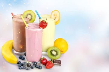 Fruit Smoothies with Straws  Isolated on a White Background