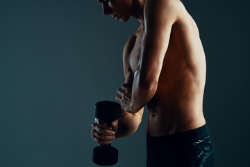 young man lifting weights