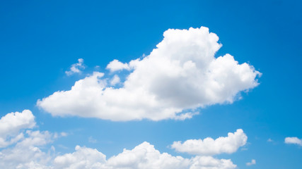 Obraz na płótnie Canvas White clouds on a blue sky at the daytime sky.