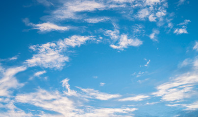 Naklejka na ściany i meble White clouds on a blue sky at the daytime sky.