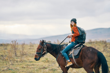 young woman riding horse