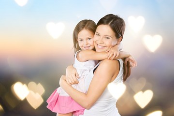 Happy Mother and daughter hugging