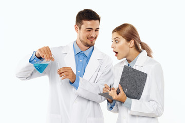 two scientists working in laboratory