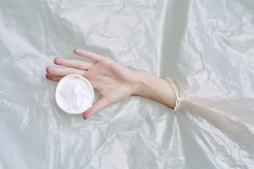 bride putting a wedding ring on brides finger