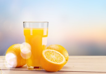 Orange juice and slices of orange on background © BillionPhotos.com