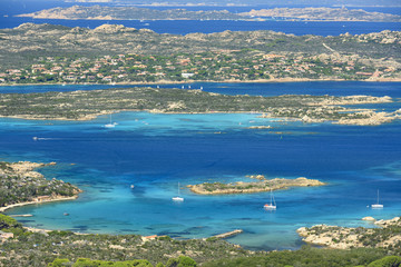 View from above, stunning aerial view of La Maddalena Archipelago with its beautiful bays bathed by a turquoise clear water. La Maddalena Archipelago, Sardinia, Italy.