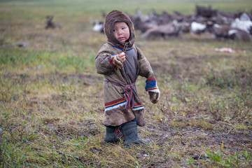 tundra, The extreme north, Yamal, the pasture of Nenets people, children on vacation playing near reindeer pasture