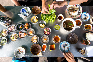 Top view of family enjoy eating Dim Sum breakfast together.