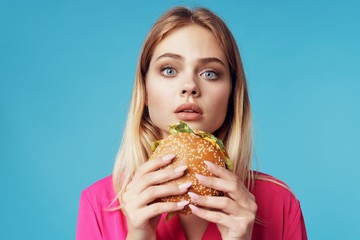 woman with hamburger
