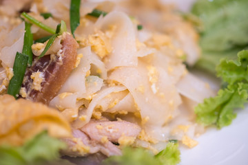 Chinese-Thai dish made with stir-fried rice noodles mixed with chicken