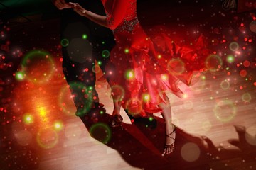 Man and a woman dancing Salsa on background