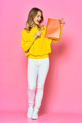 young woman with shopping bags