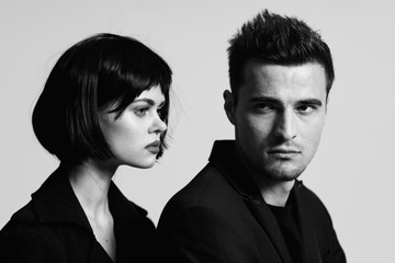 portrait of young man and woman