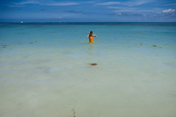young woman with long hair and clear skin