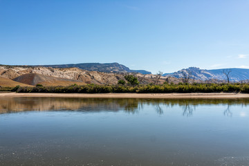 High angle view of Green River in Utah Dinosaur National Monument Park with water and beach shore