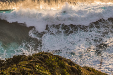 crashing waves on the cliff