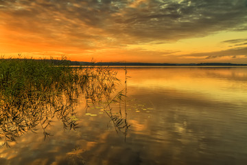 Sunset in a small lake - 289618055