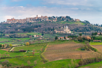 Fototapeta na wymiar The medieval Montepulciano town on the hill and Church of San Biagio at Tuscany area, Italy.