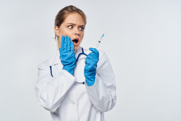 young doctor with syringe