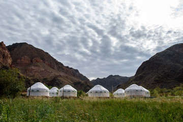 Camping from yurts. Charyn canyon, Charyn river valley. Red rocks and vertical canyon. Almaty...