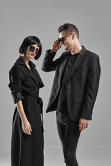 man and woman fighting with gun