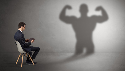 Businessman staying and offering stuffs to a shadow businessman