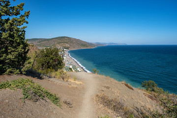 The Black Sea coast view of the village of Rybachye on a summer day, Crimea.