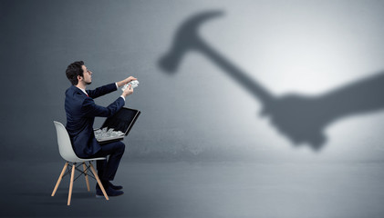Small businessman staying and offering stuffs for an armed shadow hand