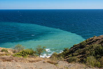 View of the Black Sea from the high bank on a summer day, Crimea.