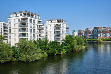New apartment buildings at the waterfront of the river Spree in Berlin, Germany