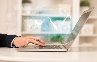 Business woman in homey environment using laptop with global financial report concept