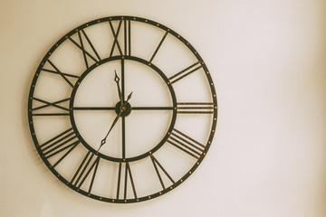 Old Clock made of wrought iron wall