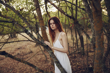 young woman in forest