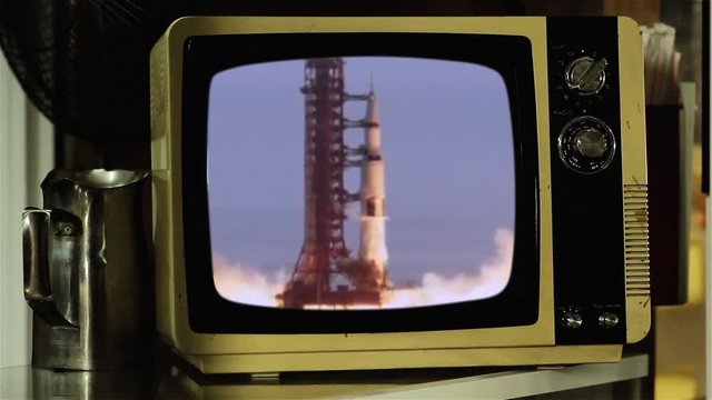  Apollo 11 Rocket Launch in a Retro TV. Elements of this image furnished by NASA.  