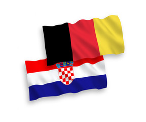 National vector fabric wave flags of Croatia and Belgium isolated on white background. 1 to 2 proportion.