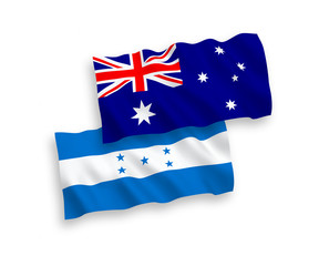 Fototapeta premium National vector fabric wave flags of Australia and Honduras isolated on white background. 1 to 2 proportion.