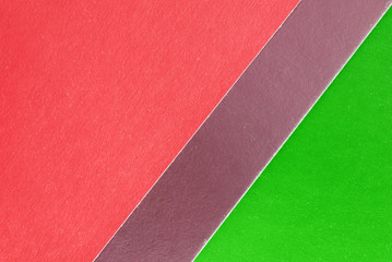Fototapeta premium Colorful sheets of paper close up, top view. Abstract background